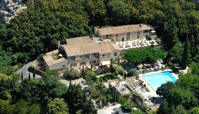 Hire a helicopter for a gourmet escapade at Loustau de Baumaniere in Baux de Provence