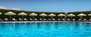Private jet and helicopter charter to Dekelia Tatoi