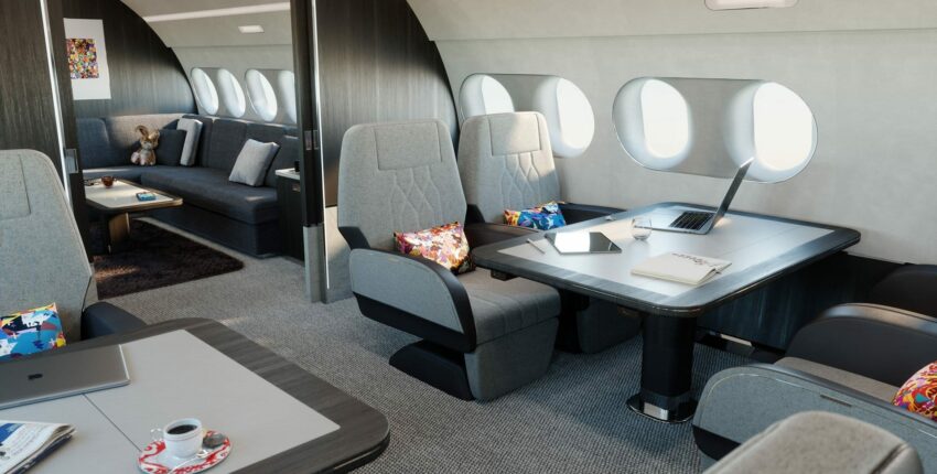Intérieur luxueux du jet ACJ 220 privé, sièges confortables.