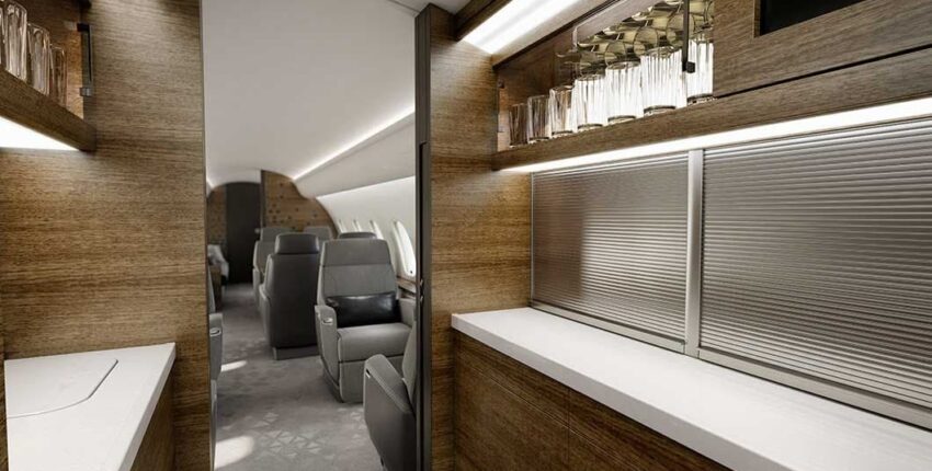 Location de jet privé, intérieur luxueux en bois et verre.