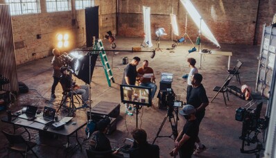 Transporting film crews and production equipment: use private aviation.