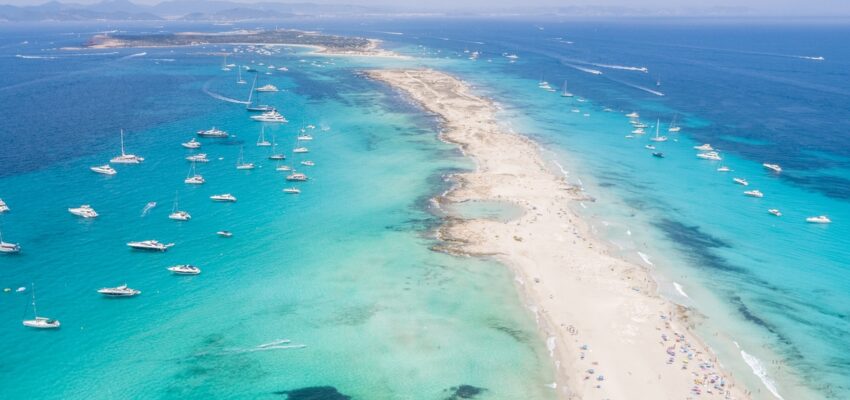Formentera aerial view of turquoise water and yachts anchored